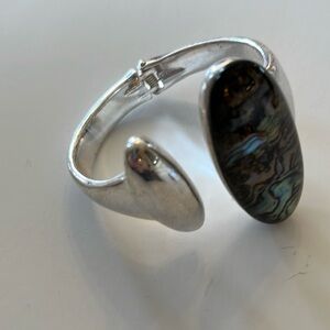 Robert Lee Morris bracelet. Silver toned with black tan aqua color center accent